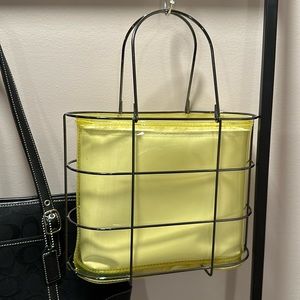 Unique metal caged clear yellow PVC bag. Vintage 1999